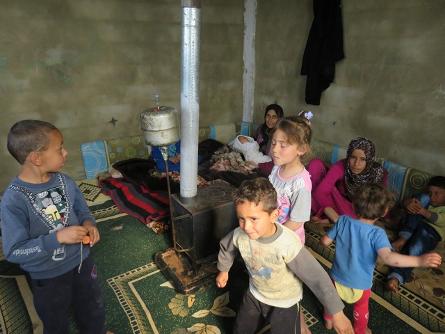 One of the rooms in the chicken coops for one family, Including a baby just born. (Photo: Pam Bailey)
