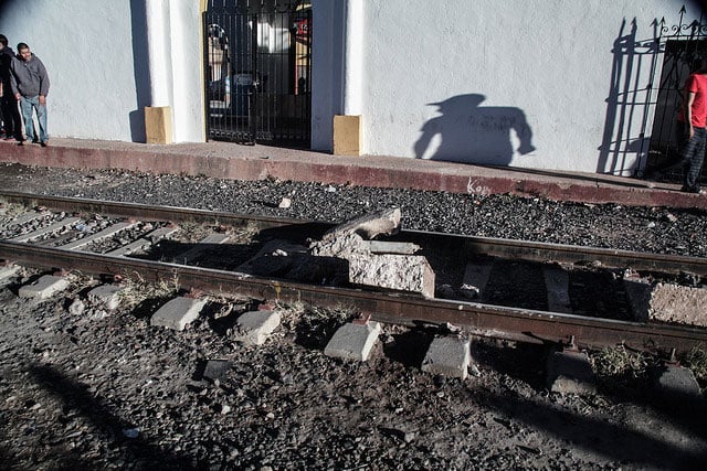 Protesters lay concrete blocks along the train tracks near the US-Mexico border in Nogales, Sonora, in order to stop international trade.