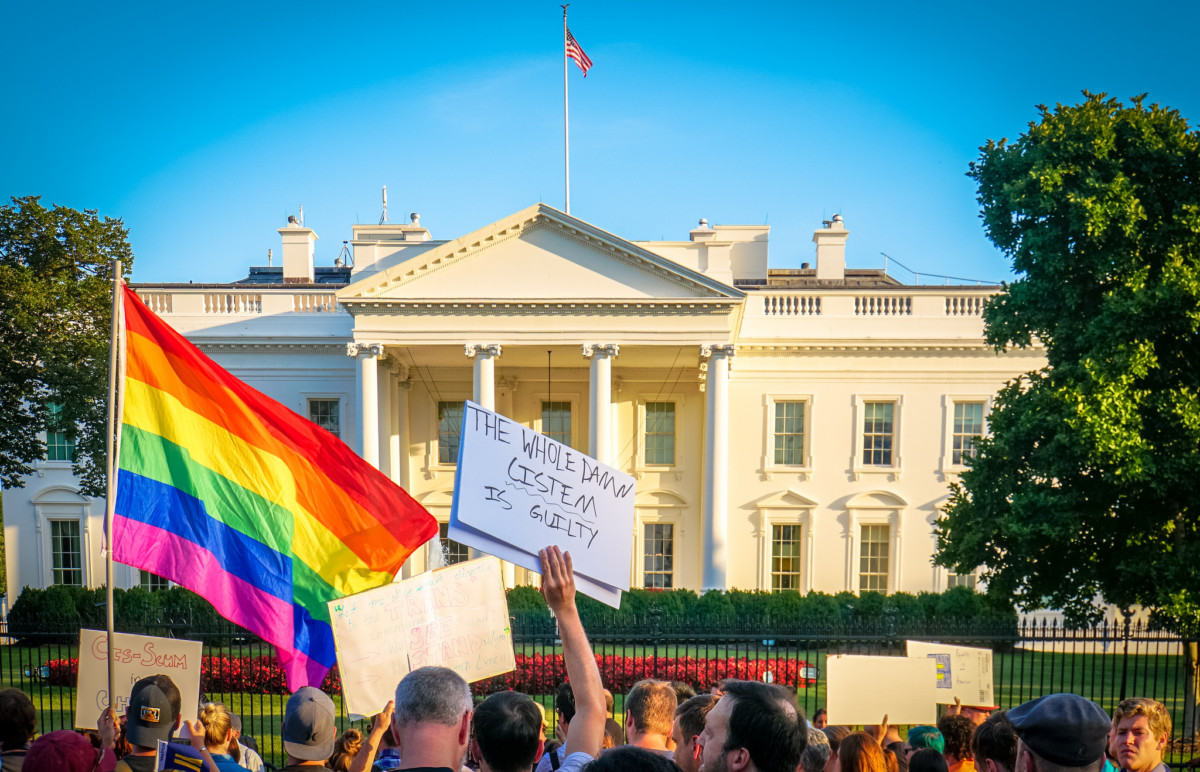 Protesters rally against Donald Trump's ban on transgender people serving in the military in front of the White House on July, 26, 2017.