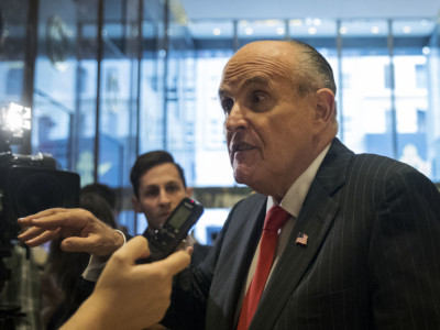 Former New York City Mayor Rudy Giuliani speaks to reporters at Trump Tower, January 12, 2017, in New York City.