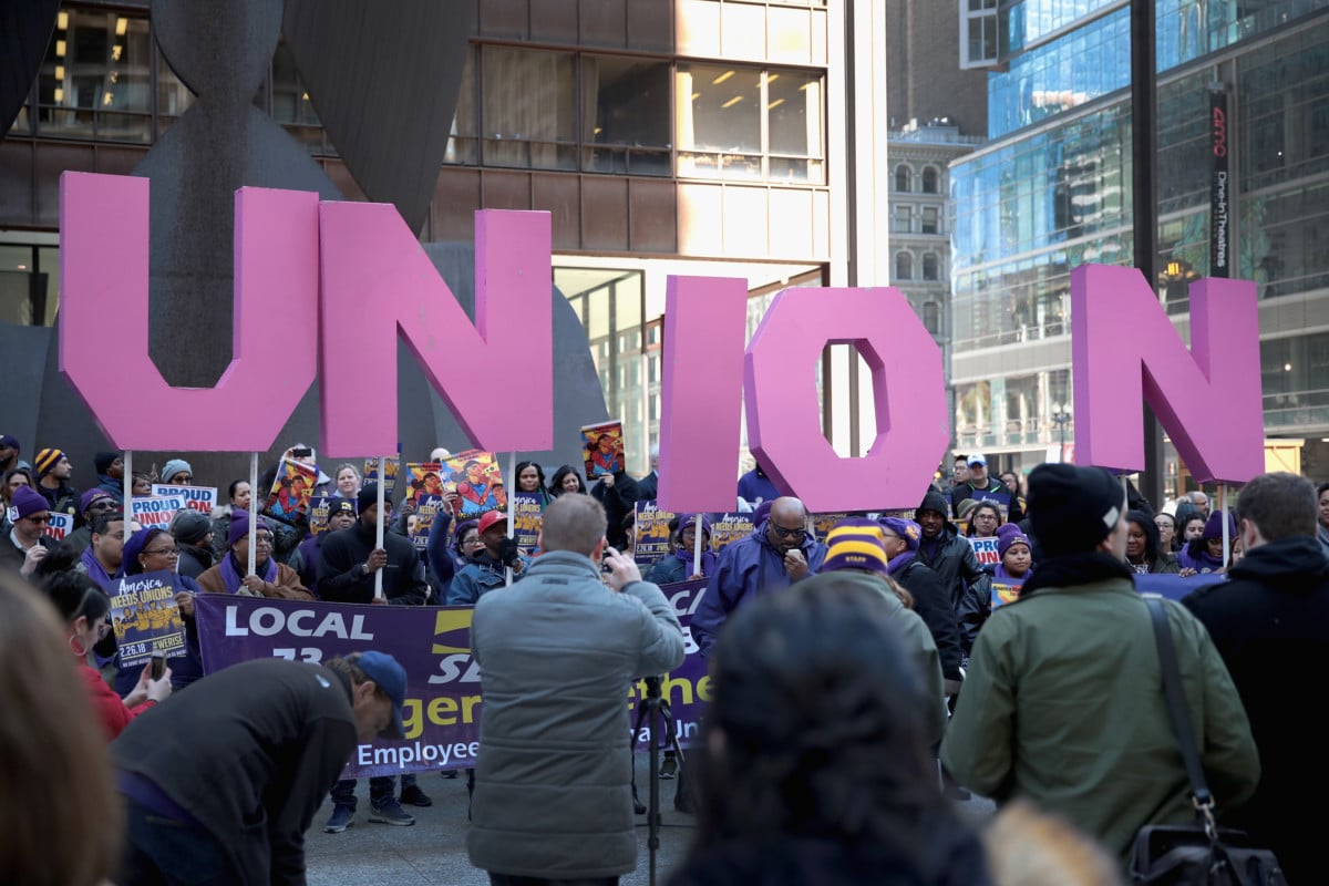 Members of the Service Employees International Union hold a rally in support of the American Federation of State County and Municipal Employees union at the Richard J. Daley Center plaza on February 26, 2018 in Chicago, Illinois.