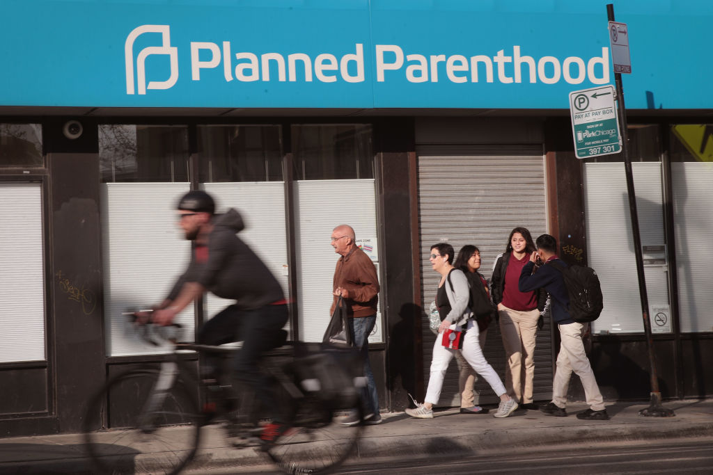Pedestrians walk past a Planned Parenthood clinic on May 18, 2018, in Chicago, Illinois.