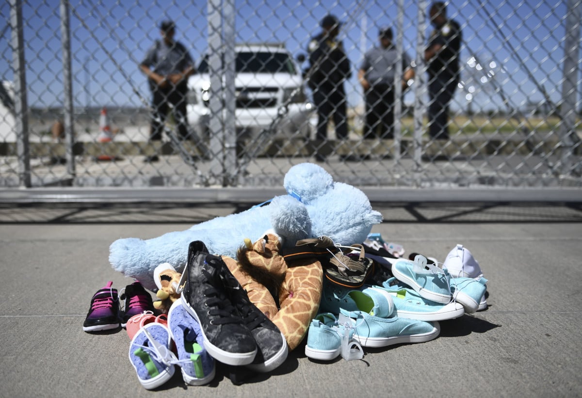 Shoes are left by people at the Tornillo Port of Entry near El Paso, Texas, June 21, 2018 during a protest rally by several American mayors against the US administration's family separation policy.