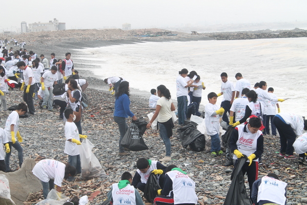 Volunteers from the Peruvian Institute for the Protection of the Environment Vida clean up the waste washed up by the sea on the coast near Lima. Half of the 6,000 tonnes of marine debris collected by the organisation since 1998, with the support of 200,000 volunteers, is disposable plastic.