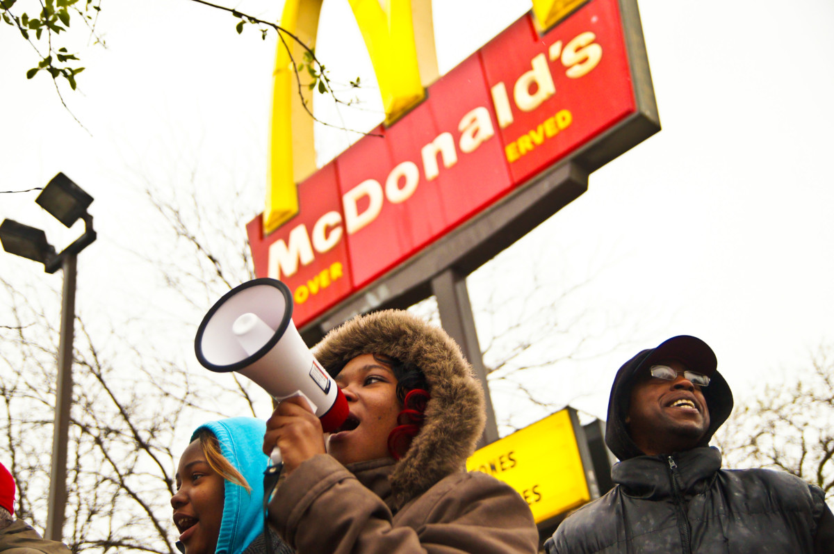 Fast-food workers protest for higher wages at a McDonald's restaurant in Milwaukee, Wisconsin, on May 15, 2014.