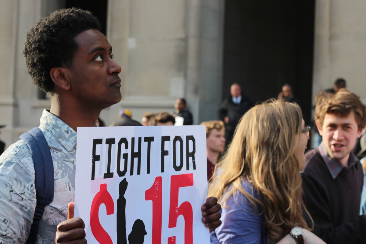 Northwestern students and 8,000 other Chicago area protesters joined the international #FightFor15, rallying for a higher minimum wage, March 27, 2014.
