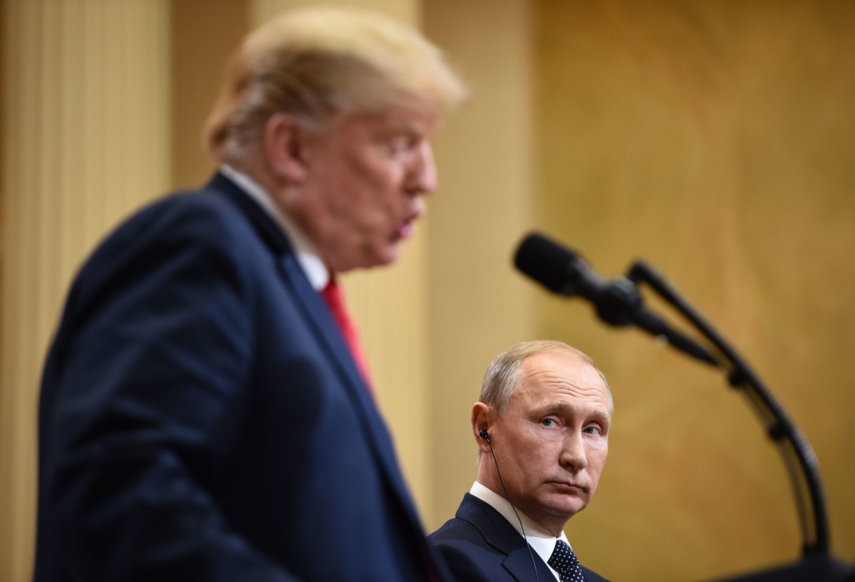 Donald Trump and Russian President Vladimir Putin attend a joint press conference after a meeting at the presidential palace in Helsinki, on July 16, 2018.