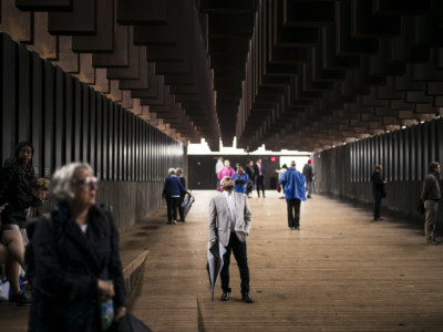 Ed Sykes (center), 77, visits the National Memorial For Peace And Justice on April 26, 2018 in Montgomery, Alabama. Sykes was distraught when he discovered his last name in the memorial. The memorial is dedicated to the legacy of enslaved black people and those terrorized by lynching and Jim Crow segregation in America.