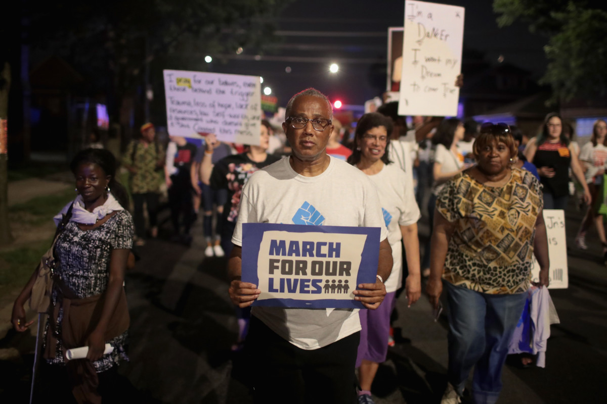 Residents participate in an end-of-school-year peace march and rally on June 15, 2018, in Chicago, Illinois.