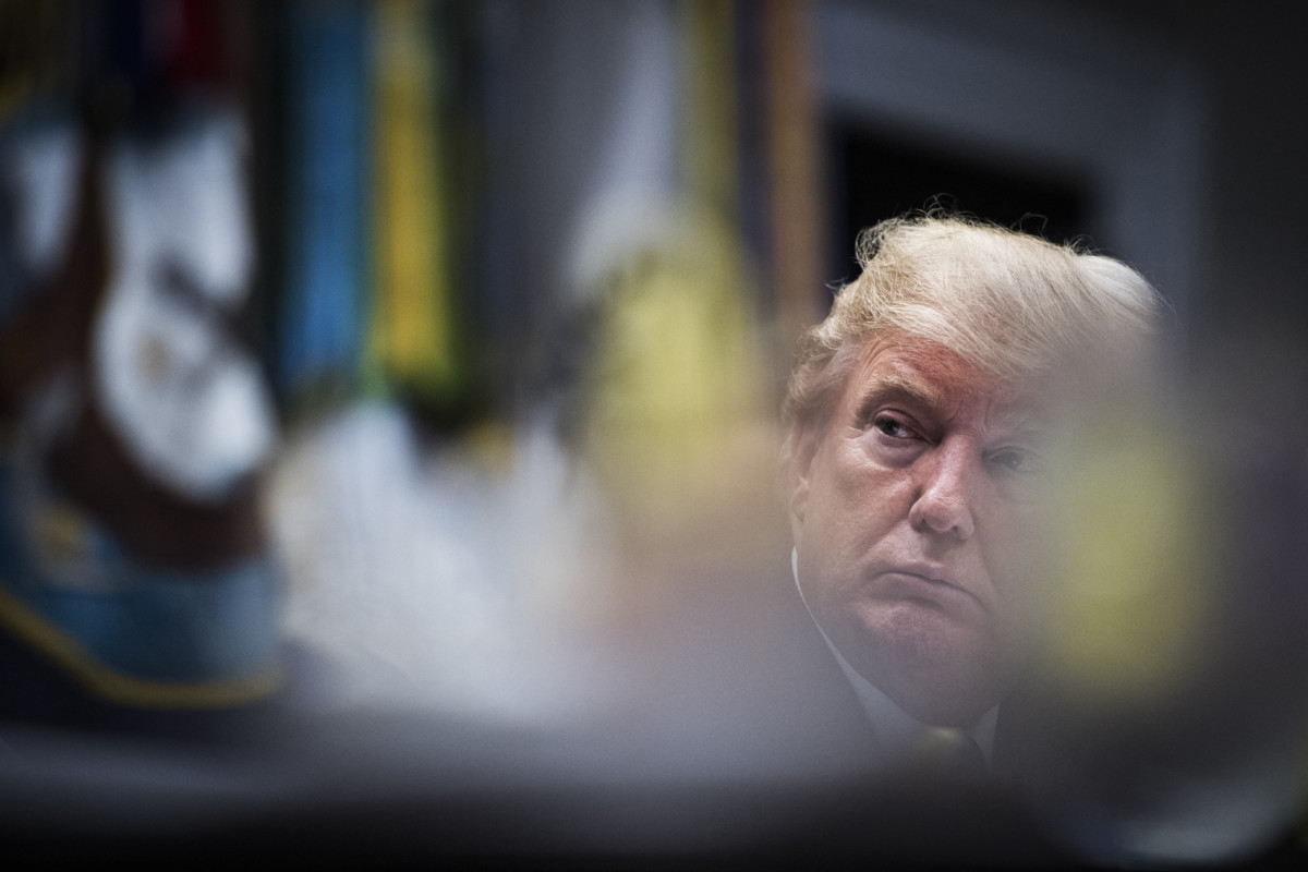 President Donald Trump listens as others speak during a working lunch with governors in the Roosevelt Room of the White House on Thursday, June 21, 2018, in Washington, DC.