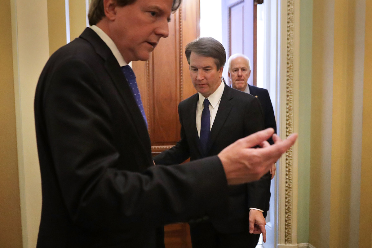 White House Counsel Don McGahn, Judge Brett Kavanaugh and Senate Majority Whip John Cornyn (R-Texas) leave his office after a meeting at the US Capitol, July 11, 2018, in Washington, DC.