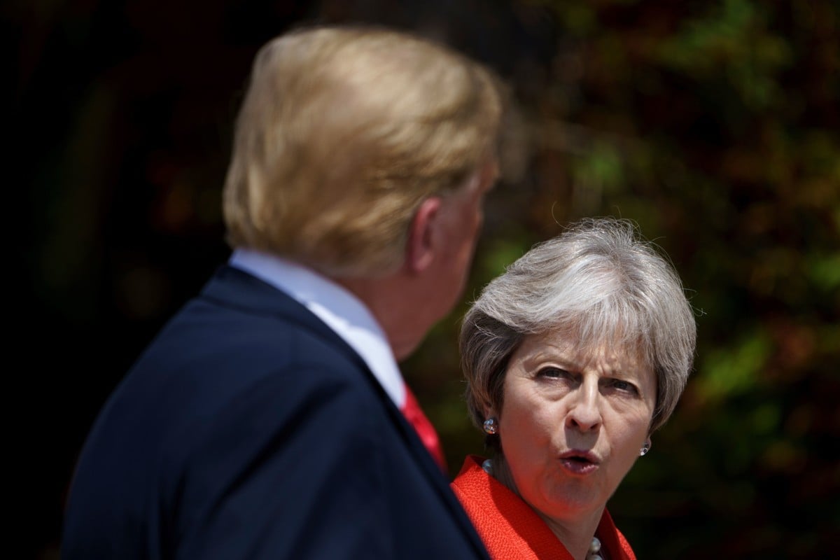 Donald Trump and Britain's Prime Minister Theresa May hold a joint press conference following their meeting at Chequers, the prime minister's country residence, near Ellesborough, northwest of London, on July 13, 2018.