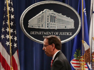 Deputy Attorney General Rod Rosenstein leaves a news conference at the Department of Justice, July 13, 2018, in Washington, DC.