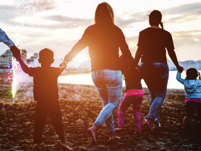 Parents with children on beach