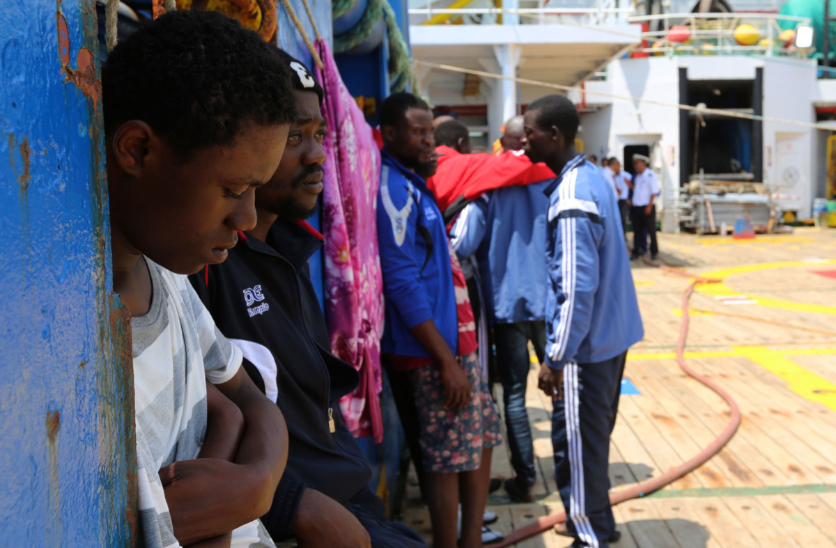 African migrants are seen aboard the ship 'Sarost 5' docked in the southern Tunisian port of Zarzis on August 1, 2018.