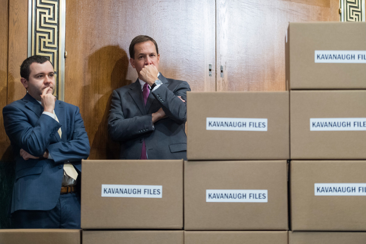 Aides attend a news conference with Republican members of the Senate Judiciary Committee in the Dirksen Building on August 2, 2018, with boxes representing roughly 1 million pages of documents to be submitted to the committee on Supreme Court nominee Brett Kavanaugh.