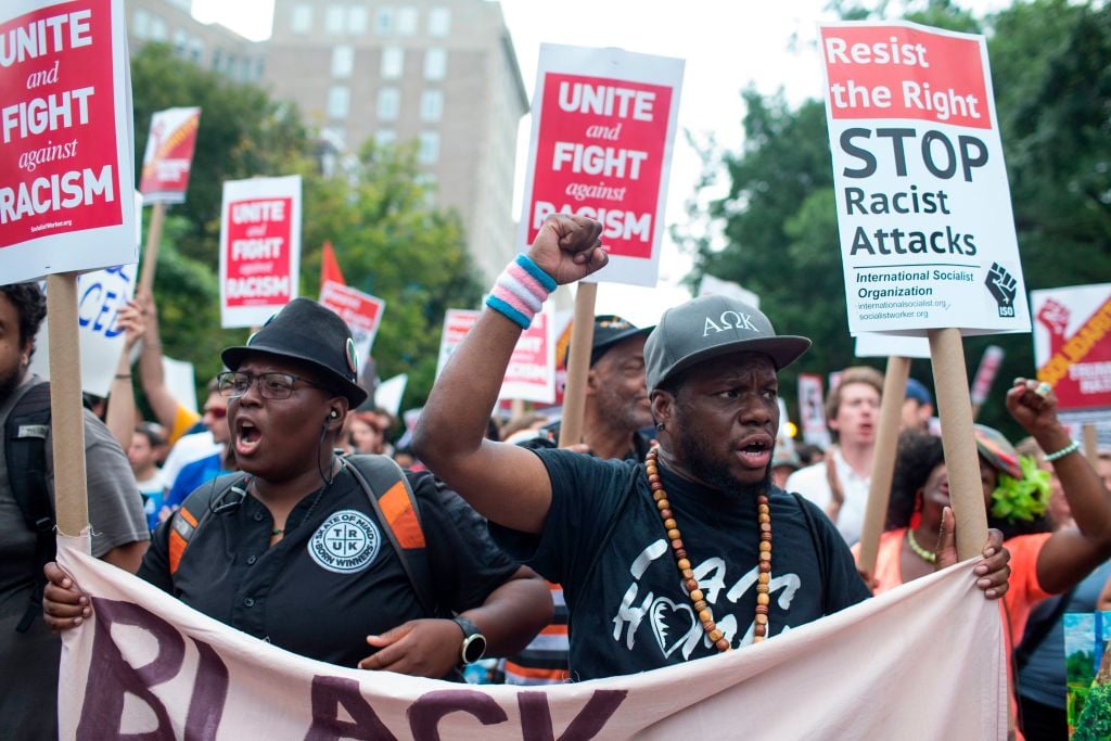 Antifa and counter protestors to a far-right rally march during the Unite the Right 2 Rally in Washington, DC, on August 12, 2018.