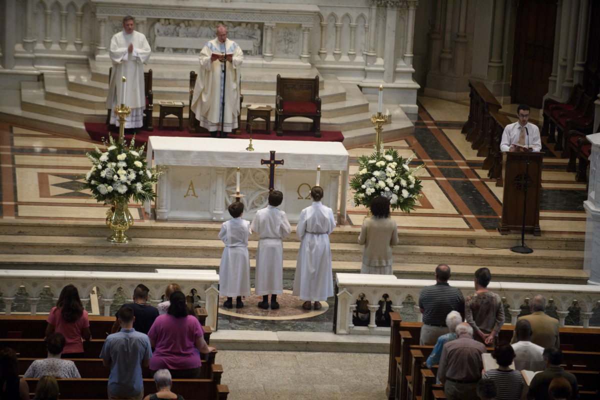 Parishioners worship during a mass to celebrate the Assumption of the Blessed Virgin Mary at St Paul Cathedral, the mother church of the Pittsburgh Diocese on August 15, 2018, in Pittsburgh, Pennsylvania. The Pittsburgh Diocese was rocked by revelations of abuse by priests the day before on August 14, 2018.