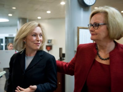 Sen. Kristen Gillibrand and Sen. Claire McCaskill talk with reporters as they arrive at the US Capitol on November 20, 2013 via way of the senate subway.
