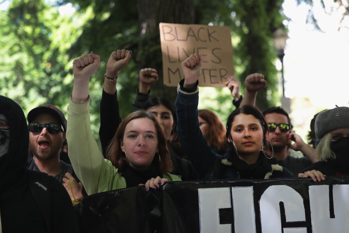 Anti-fascist demonstrators confront Trump supporters during a protest on June 4, 2017, in Portland, Oregon.