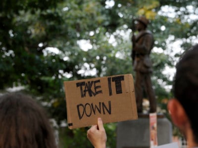 Demonstrators rally for the removal of a Confederate statue coined Silent Sam on the campus of the University of Chapel Hill on August 22, 2017, in Chapel Hill, North Carolina. Students and other protesters tore the statue down on August 20, 2018.
