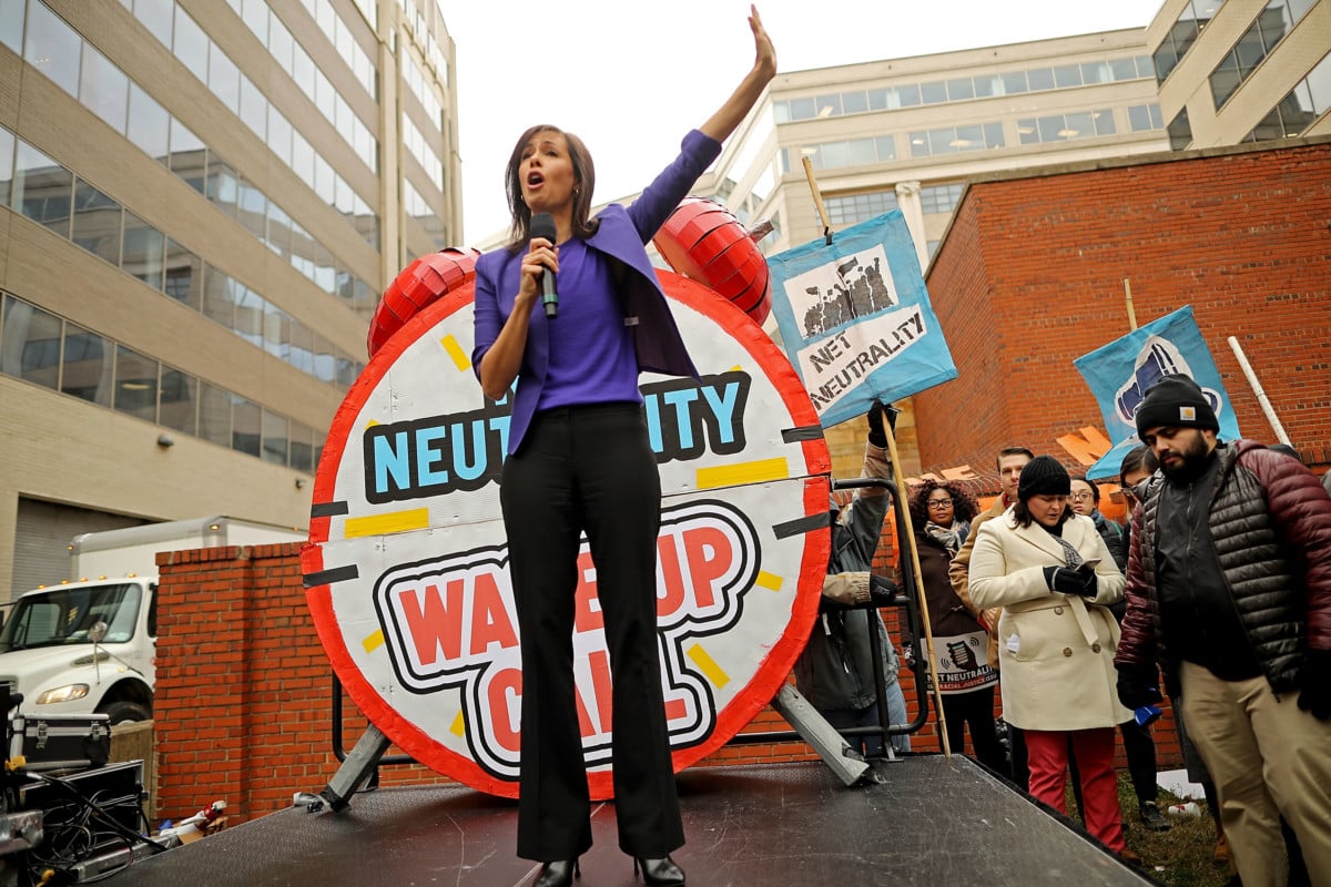 Federal Communication Commission (FCC) Commissioner Jessica Rosenworcel addresses protesters outside the FCC building to rally against the end of net neutrality rules on December 14, 2017, in Washington, DC.