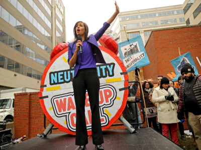 Federal Communication Commission (FCC) Commissioner Jessica Rosenworcel addresses protesters outside the FCC building to rally against the end of net neutrality rules on December 14, 2017, in Washington, DC.