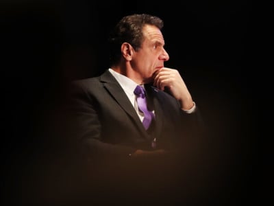 New York Governor Andrew Cuomo watches as former Vice President Al Gore speaks at an event at New York University, denouncing the Trump administration's proposal to open up new areas to offshore drilling, on March 9, 2018, in New York City.