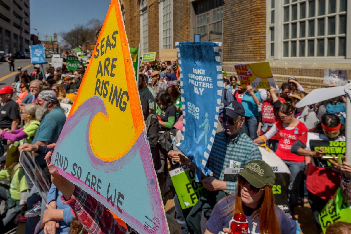 More than 1,500 people took the streets of Albany as part of the "Cuomo Walk The Talk" day of action, demanding New York Gov. Andrew Cuomo stop all fracking infrastructure, move to 100 percent renewable energy and make polluters pay, on April 23, 2018.