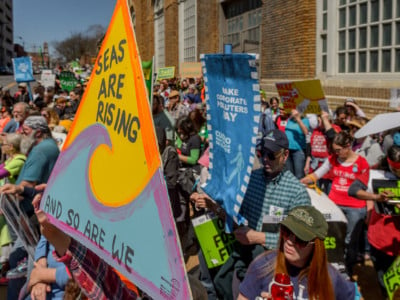 More than 1,500 people took the streets of Albany as part of the "Cuomo Walk The Talk" day of action, demanding New York Gov. Andrew Cuomo stop all fracking infrastructure, move to 100 percent renewable energy and make polluters pay, on April 23, 2018.