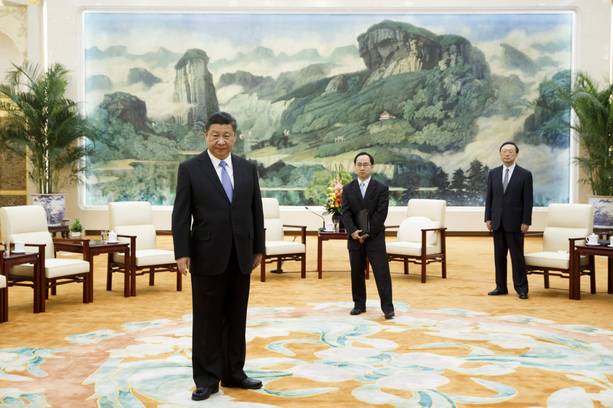 China's President Xi Jinping waits for the arrival of Britain's Prince Andrew at the Great Hall of the People in Beijing on May 29, 2018.