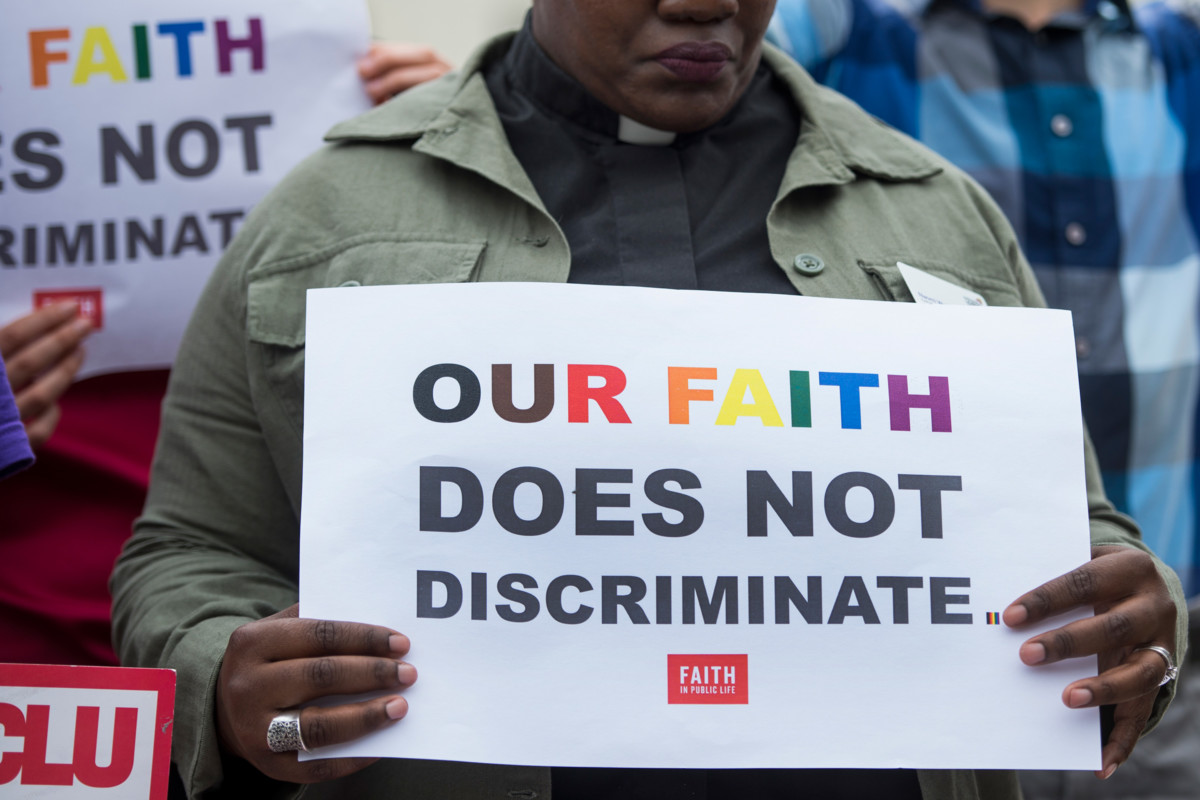 People gather outside the Supreme Court to protest the decision in Masterpiece Cakeshop v. Colorado Civil Rights Commission which ruled in favor of Colorado baker Jack Phillips on Monday, June 4, 2018.