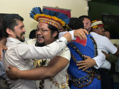 Pablo Fajardo, lawyer for the victims of environmental damage caused during Texaco's oil operations in the Ecuadoran Amazon (1964 to 1990), acquired by Chevron in 2001, celebrates with his clients, during a press conference in Quito, on July 11, 2018.