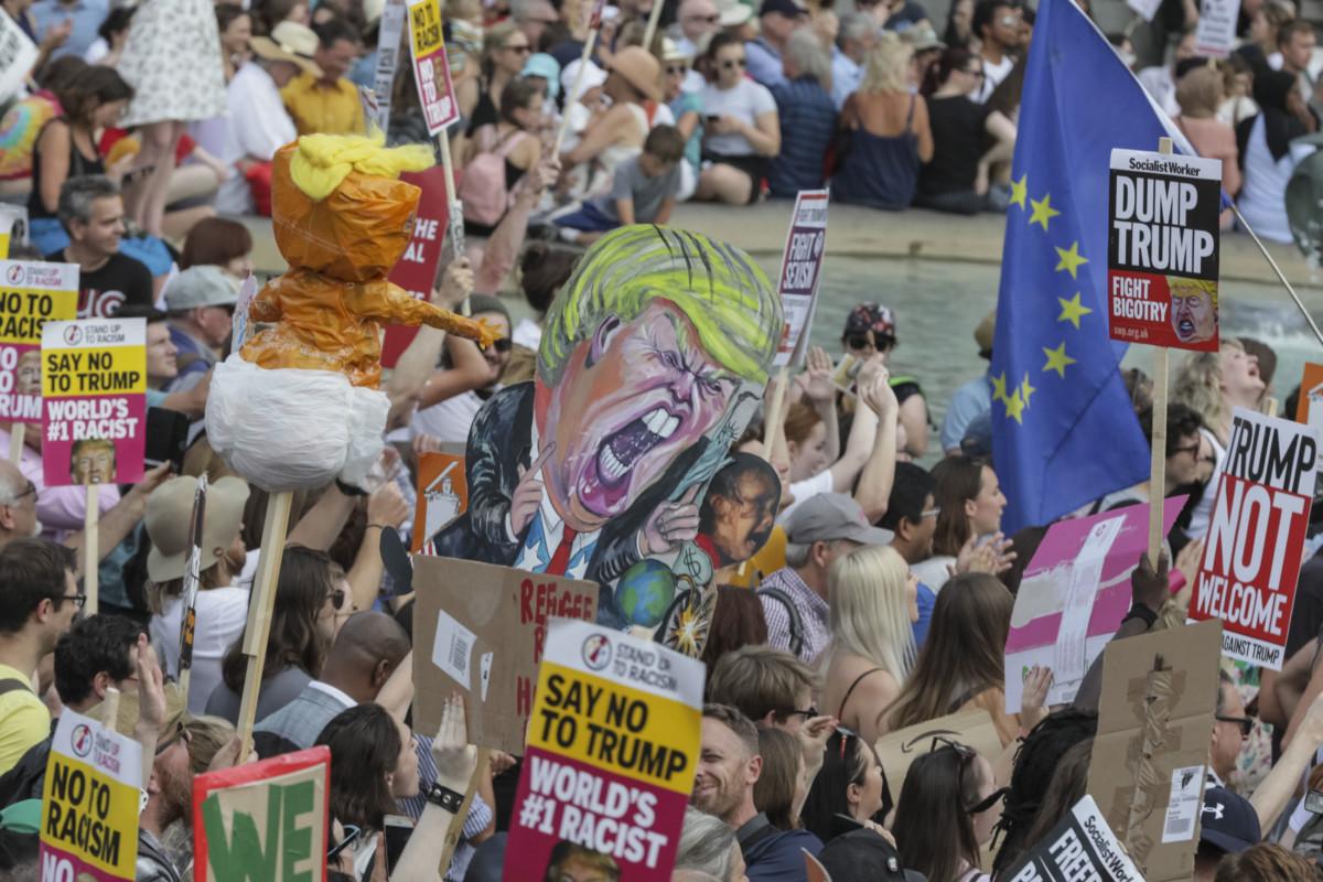 Demonstrators are seen during a demonstration against the visit to the UK by US President Donald Trump on July 13, 2018, in London, England.