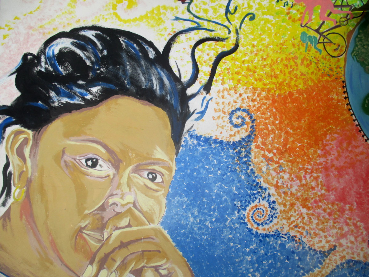 A mural on the wall of COPINH's Utopia gathering place in La Esperanza depicts Berta Cáceres, the organization's leader murdered in 2016.