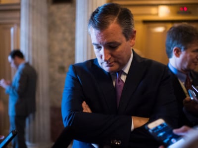 Sen. Ted Cruz talks with reporters after the Senate Policy luncheons in the Capitol on July 17, 2018.