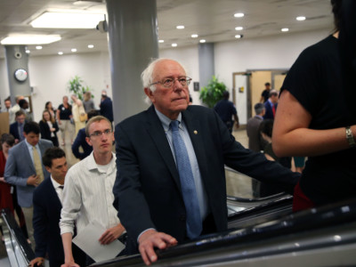 Sen. Bernie Sanders speaks to reporters as he arrives for the weekly Senate Democrat's policy luncheon at Capitol Hill on July 24, 2018, in Washington, DC.