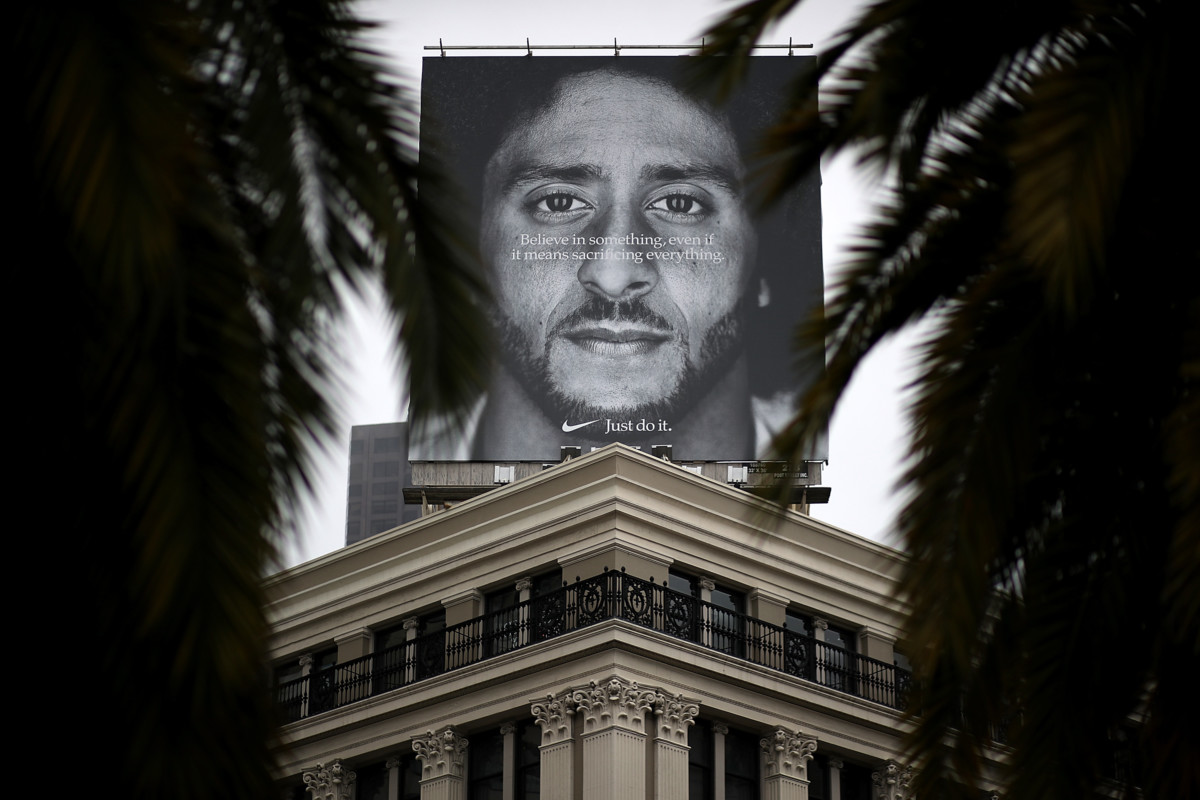 A billboard featuring former San Francisco 49ers quaterback Colin Kaepernick is displayed on the roof of a Nike store on September 5, 2018, in San Francisco, California.