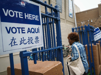 A woman arrives at a polling station in Brooklyn, New York, on September 13, 2018.