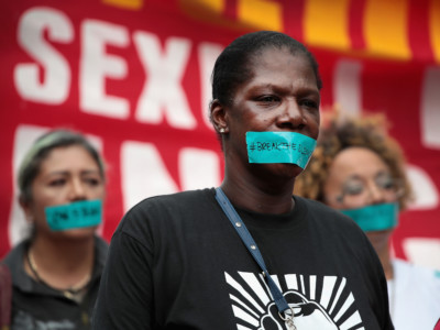 McDonald's workers are joined by other activists as they march toward the company's headquarters to protest sexual harassment at the fast-food chain's restaurants on September 18, 2018, in Chicago, Illinois.