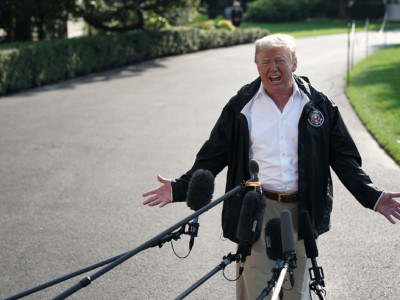 President Trump speaks to members of the media prior to a Marine One departure at the south lawn of the White House on September 19, 2018, in Washington, DC.