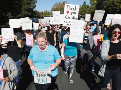 Supporters of Dr. Christine Blasey Ford march and chant in Palo Alto, Calif., Thursday, Sept. 20, 2018, in support of their neighbor who recently came forth with sexual assault allegations against Supreme Court nominee Brett Kavanaugh.
