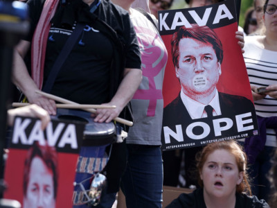 Activists participate in a rally in front of the US Supreme Court September 28, 2018, in Washington, DC.