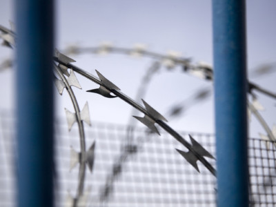 Prison bars and razor wire