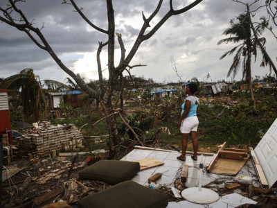 Resident Mirian Medina stands on her property about two weeks after Hurricane Maria swept through the island on October 5, 2017, in San Isidro, Puerto Rico.