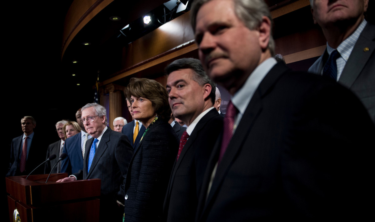 Senate Majority Leader Sen. Mitch McConnell and other Republicans speak to the press after the Senate passed tax reform legislation on Capitol Hill December 19, 2017, in Washington, DC.