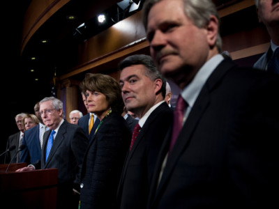 Senate Majority Leader Sen. Mitch McConnell and other Republicans speak to the press after the Senate passed tax reform legislation on Capitol Hill December 19, 2017, in Washington, DC.