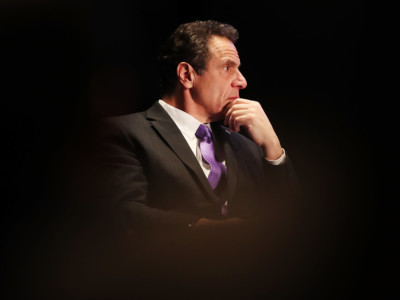 New York Gov. Andrew Cuomo watches as former Vice President Al Gore speaks at an event at New York University on March 9, 2018, in New York City.