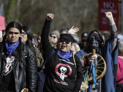 Indigenous leaders, coast protectors, and others demonstrate against the expansion of the Trans Mountain pipeline expansion project in Burnaby, British Columbia, Canada, on March 10, 2018.