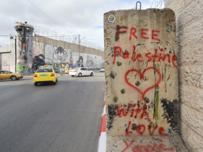 Political and social mural paintings and graffiti on the Israeli West Bank barrier in Bethlehem, Palestine, March 13, 2018.